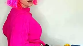 Maid in lingerie gropes her big natural tits and rides dildo on bed