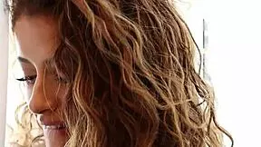 Curly Alana Reay strips to reveal perfect curves