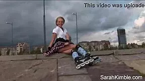 Sweet Sarah Kimble rollerblades through park flashing her naked pussy up close