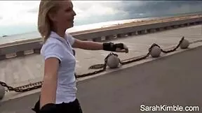 Sweet Sarah Kimble rollerblades through park flashing her naked pussy up close