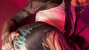 dreadlocked tattooed goth fists her latex-covered ass?!