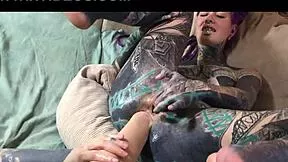 dreadlocked tattooed goth fists her latex-covered ass?!