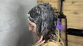 blonde teen fingers deep in shower to orgasm