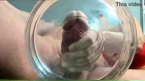 A gilf receives slow-motion cumshot in water from her muscular friend