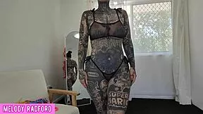 MILF tries sheer micro bikini highlighting huge tits and curves