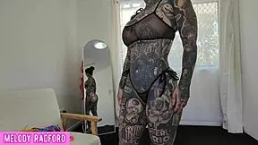 MILF tries sheer micro bikini highlighting huge tits and curves