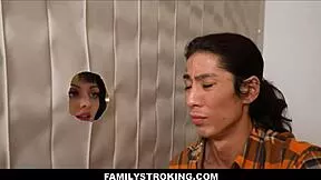 Cute stepsister strokes big cock stepbrother through glory hole at home!