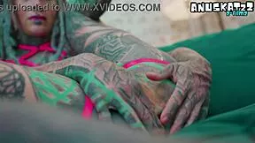 heavily tattooed goth rides anal toys in lingerie