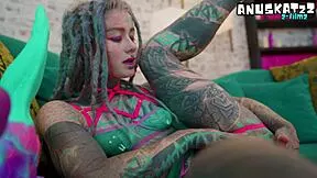 heavily tattooed goth rides anal toys in lingerie