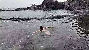 A stepmom sucks candy on beach then slurps stepson's cock hungrily