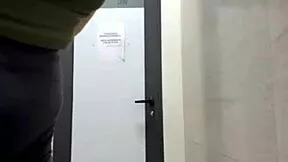 slipping anal plug in then fingering at the gym