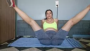 How does her tight pussy gape so wide during this intense yoga stretching and fisting session???