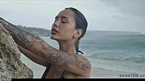 i can't stop watching this skinny asian babe rub her small tits on public beach nude😍