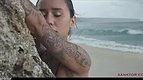 i can't stop watching this skinny asian babe rub her small tits on public beach nude😍