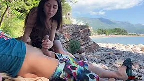 skinny brunette grabs stranger's cock on beach flashing publicly till he explodes cum