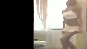 she sways her hips dancing in heels and short skirt just for you