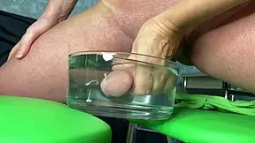 Watch stepmom's muscular hands milk huge cock in water for squirting sperm orgasm closeup femdom