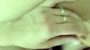 Brunette teen fingers wet pussy closeup in steamy shower solo play