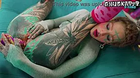skinny tattooed goth slut in miniskirt and heels stretches tight asshole with ANAL TOYS dildo fingering and squirting