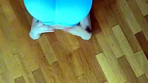 petite fitness babe stretches her body in tight leggings homemade workout