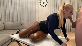 oily big-tittied blonde teen in latex pants slurps condom-covered cock deep
