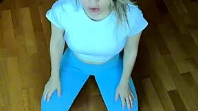 petite fitness babe stretches her body in tight leggings homemade workout