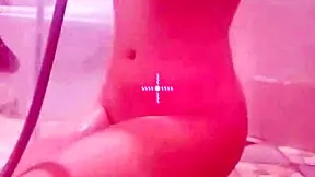 sensual asian babe teases wet pussy and curves under steamy shower water