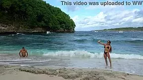 wanna see this hot brunette deepthroat my huge cock on the beach?