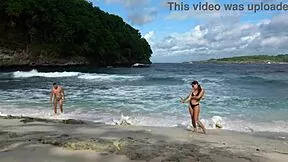 wanna see this hot brunette deepthroat my huge cock on the beach?