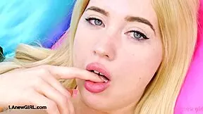 Cute blonde teen poses sexy on sofa during her amateur photoshoot interview