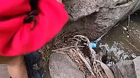 Backshots pounding her fat ass by the river