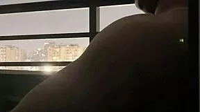 Brunette balcony blowjob tease from amateur hotel couple Nysdel