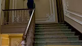 Overweight tutor faces strict discipline from eager young pupil in garage