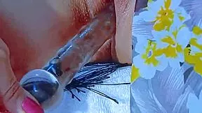 wet latina teen's pink shaved pussy stretched by glass dildo post-beach