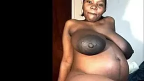 pregnant ebony's huge black boobs tease strangers with dildo play