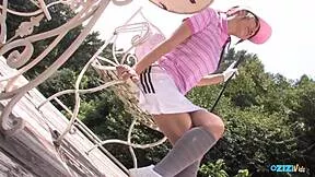 golf practice ends with fierce lady on knees deepthroating two cocks outdoors