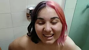 This young pregnant girl loves showing off her belly while peeing homemade