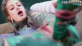 Ever seen a tattooed hippie gape her asshole with a massive dildo?