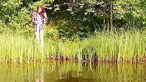 Redhead Nude by the Lake