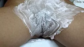 imagine shaving that hairy pussy smooth with watermelon foam in closeup kinky bath