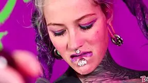 Tattooed goth beauty fingers her gaping asshole deep in wild solo anal fisting masturbation.