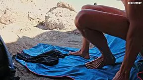 topless lady gets handjob surprise on beach from slut