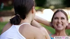 hey babe check out this big tits lesbian trainer licking her petite client's wet pussy outdoors