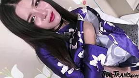 Petite thai shemale shows off her tight body solo