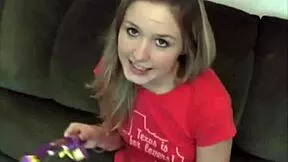 Petite teen strips clothes and plays alone on sofa