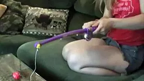 Petite teen strips clothes and plays alone on sofa
