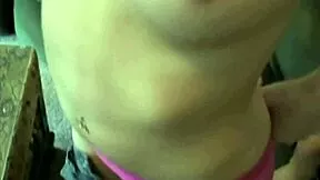 Petite teen strips clothes and plays alone on sofa