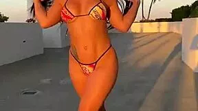 hey check out this hot brunette latina babe with big tits and ass at the gym