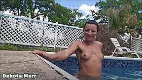 dakota marr goes skinny dipping then masturbates nude by the pool publicly