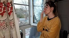 stepsister lights up cigarette and smokes seductively